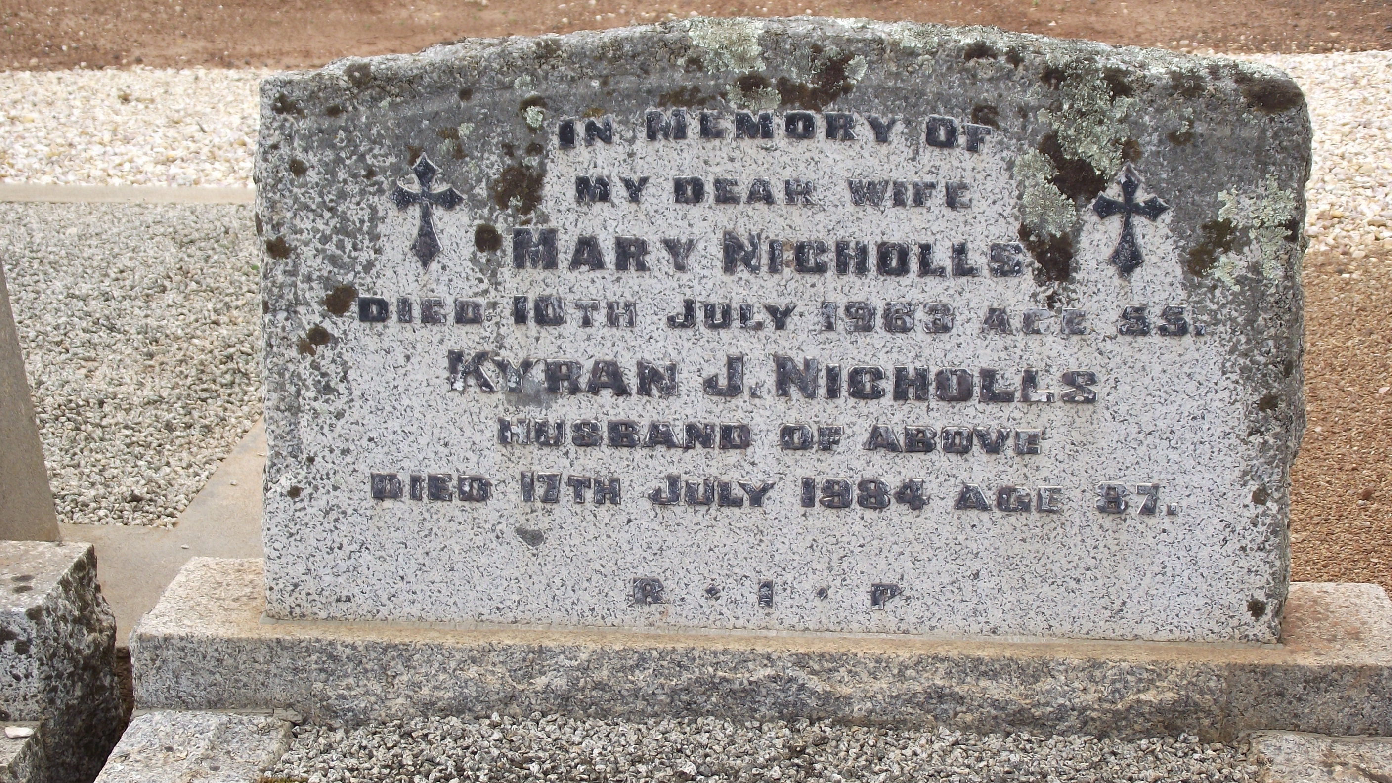 weathered granite headstone